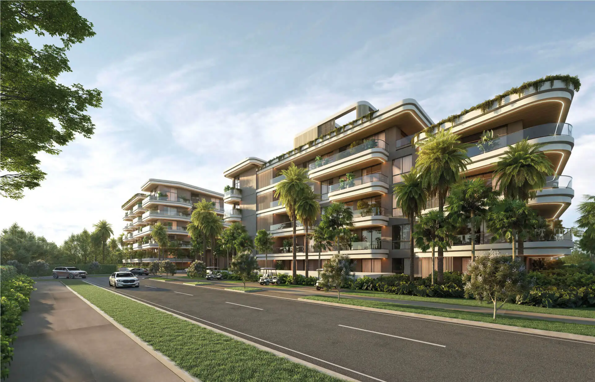 Street view of the ELITE Cap Cana buildings with terraces and landscaped gardens