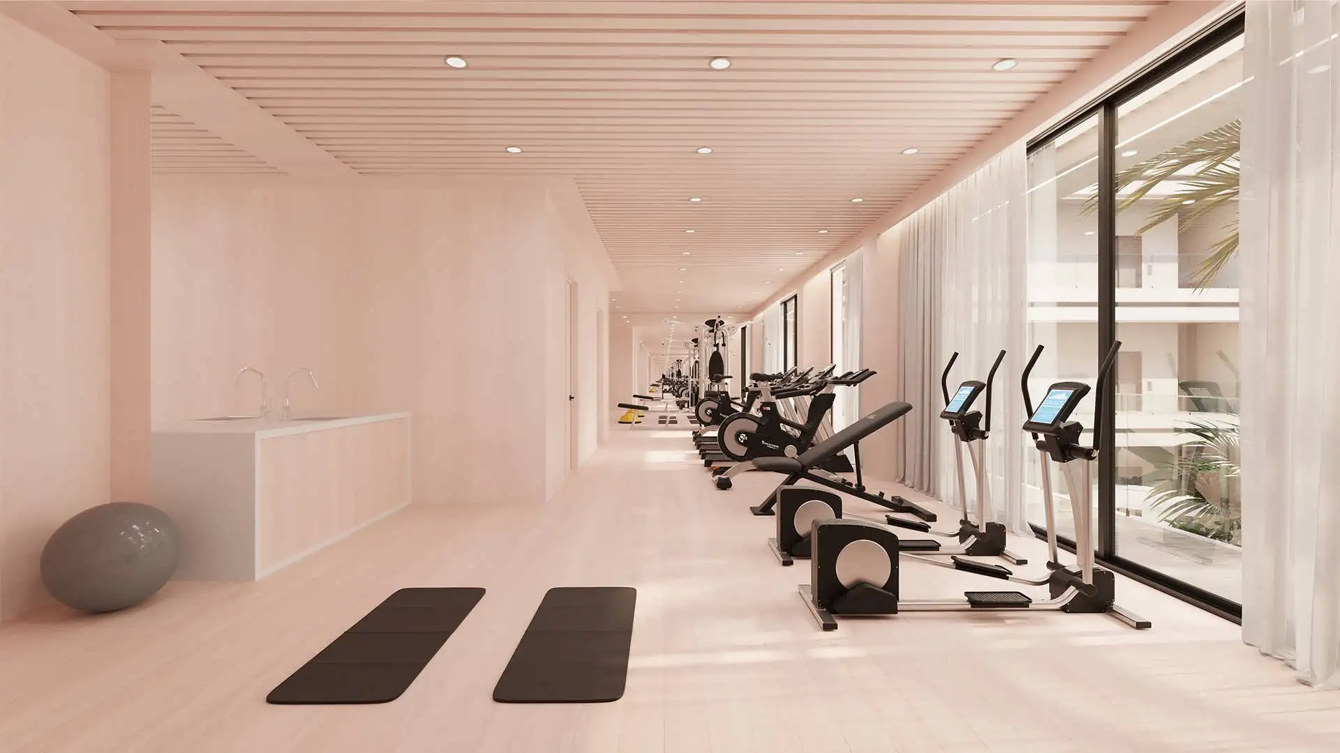 Fitness center with cardio machines and yoga area overlooking the gardens, ELITE Cap Cana