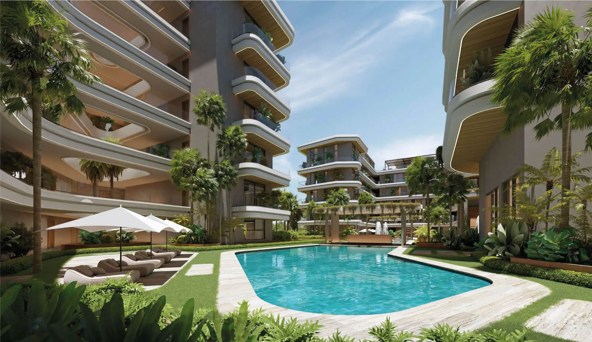 Resort-style pool with sun loungers between the residential buildings, ELITE Cap Cana